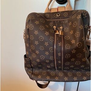 Brown and tan knock off backpack/shoulder bag